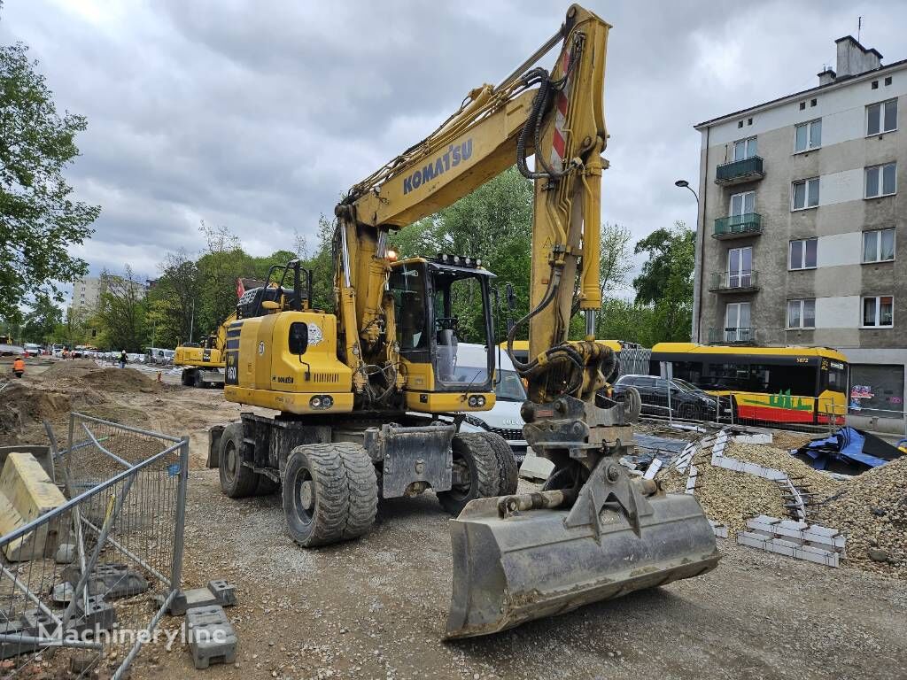 Komatsu PW 160 mobiele graafmachine