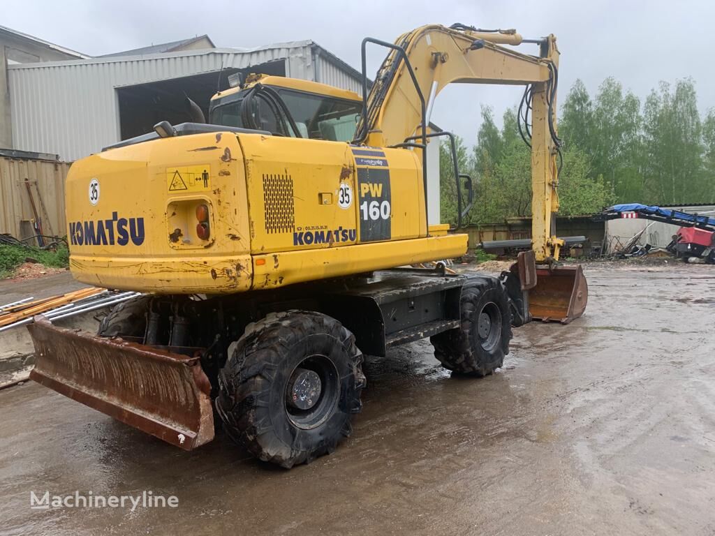 Komatsu PW160 mobiele graafmachine